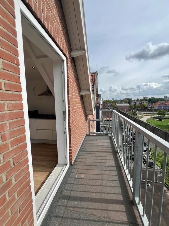 2-slaapkamerappartement met balkon in Oude Noorden - Afbeelding 6