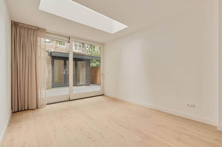 Gasloos benedenhuis met tuin in Erasmuspark - Afbeelding 2