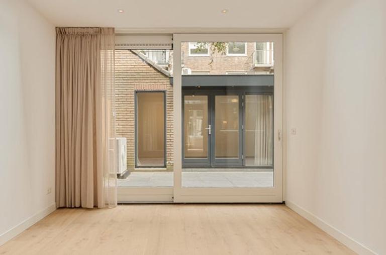 Gasloos benedenhuis met tuin in Erasmuspark - Afbeelding 4