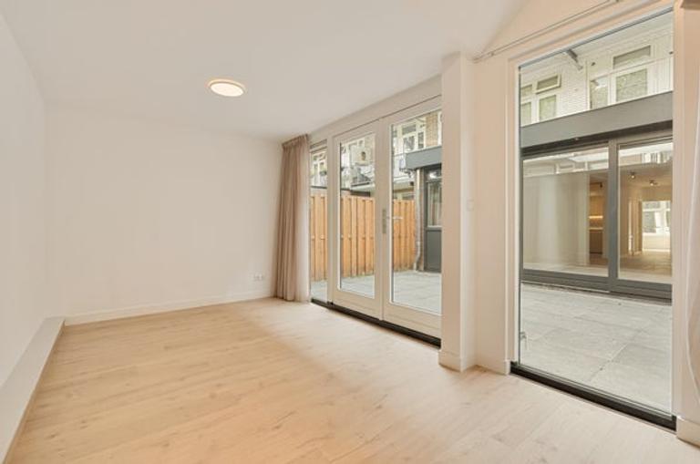 Gasloos benedenhuis met tuin in Erasmuspark - Afbeelding 7