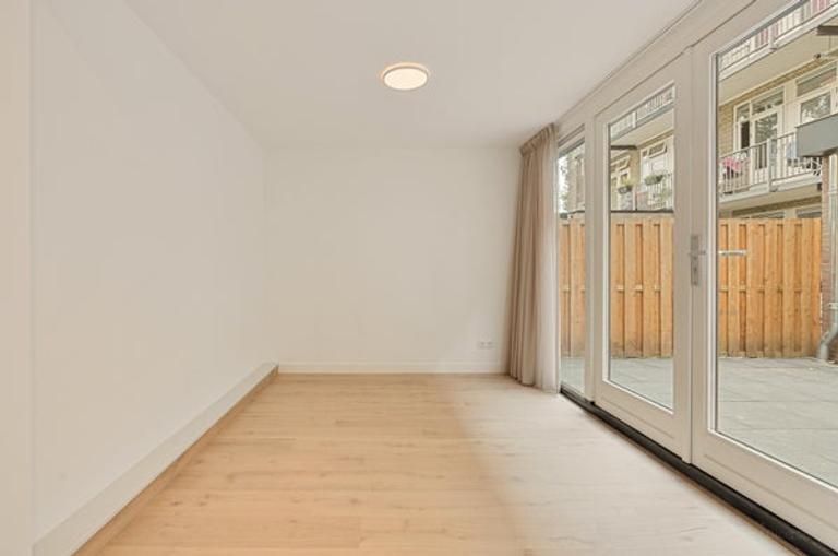 Gasloos benedenhuis met tuin in Erasmuspark - Afbeelding 8