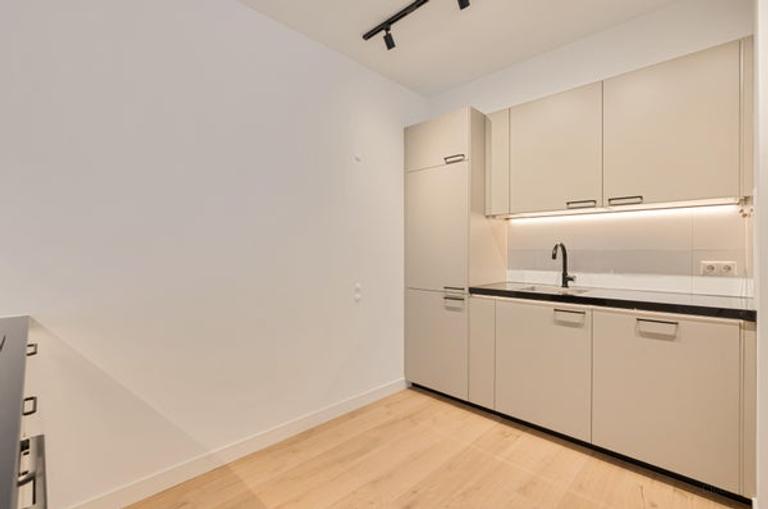 Gasloos benedenhuis met tuin in Erasmuspark - Afbeelding 17