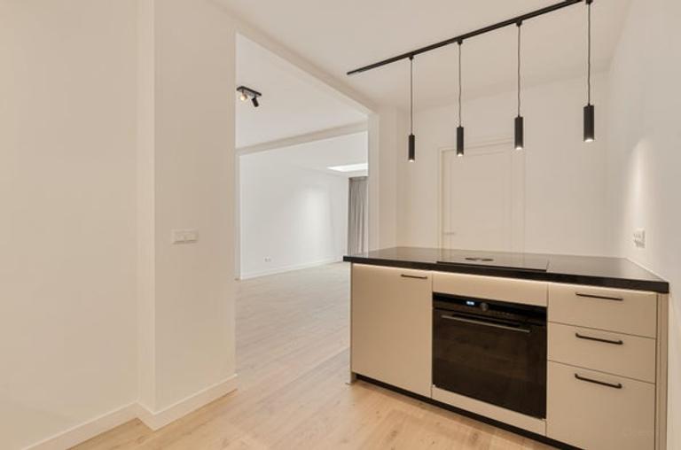 Gasloos benedenhuis met tuin in Erasmuspark - Afbeelding 19