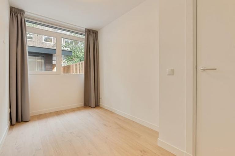 Gasloos benedenhuis met tuin in Erasmuspark - Afbeelding 26