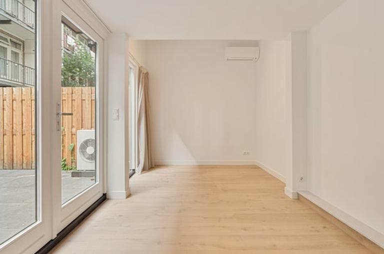 Gasloos benedenhuis met tuin in Erasmuspark - Afbeelding 28