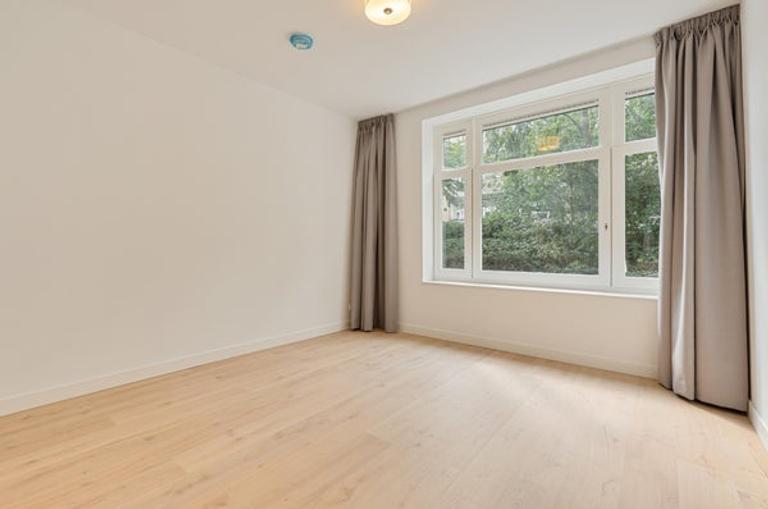 Gasloos benedenhuis met tuin in Erasmuspark - Afbeelding 31