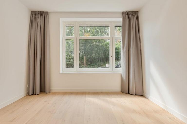 Gasloos benedenhuis met tuin in Erasmuspark - Afbeelding 34