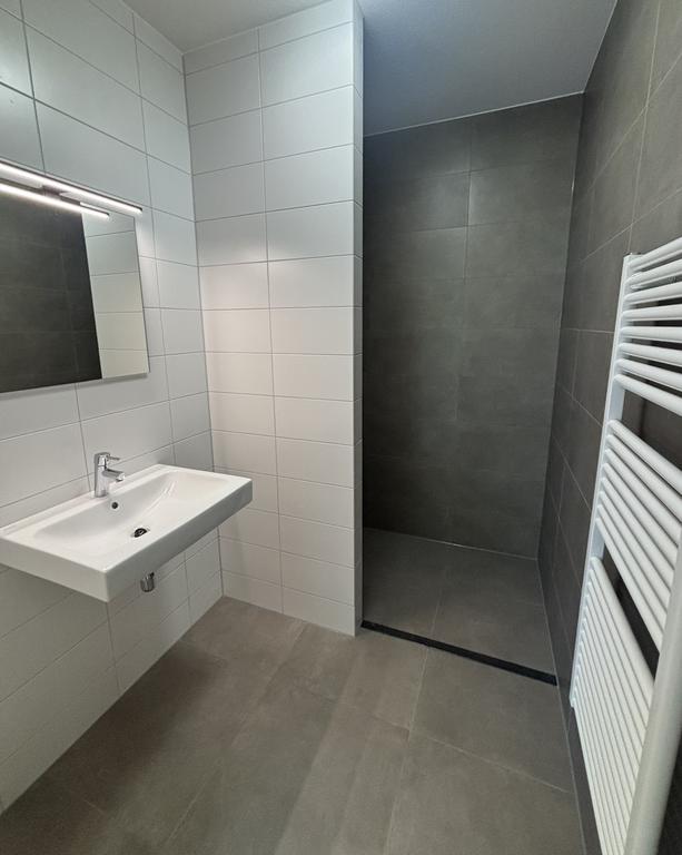 Ground-Floor 2-Bedroom Apartment with City Garden - Image 12
