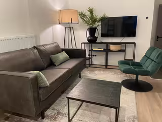 Furnished 1-Bedroom Apartment with Garden
