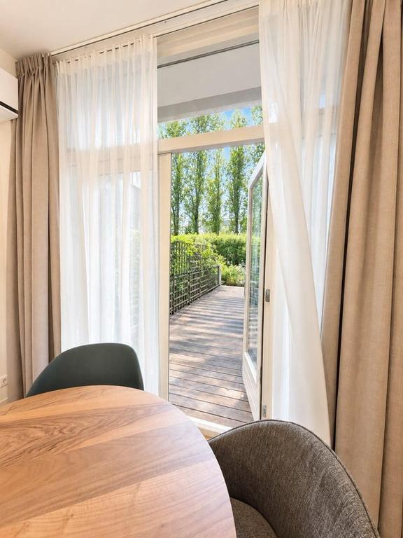 Gemeubileerd appartement met terras aan Overtoom - Afbeelding 7