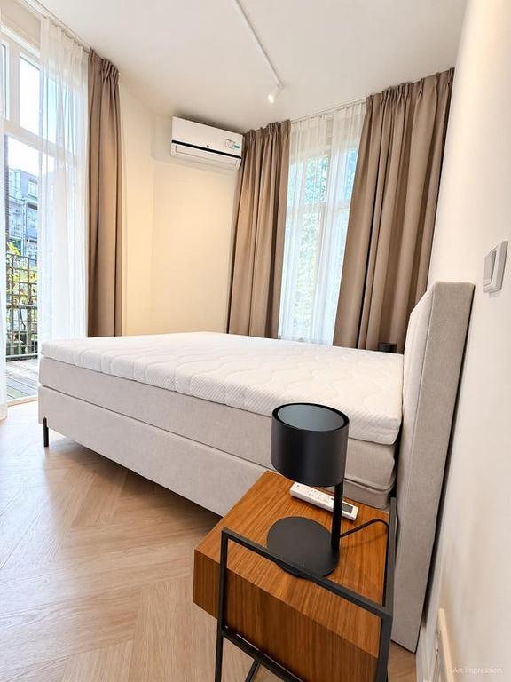 Gemeubileerd appartement met terras aan Overtoom - Afbeelding 11