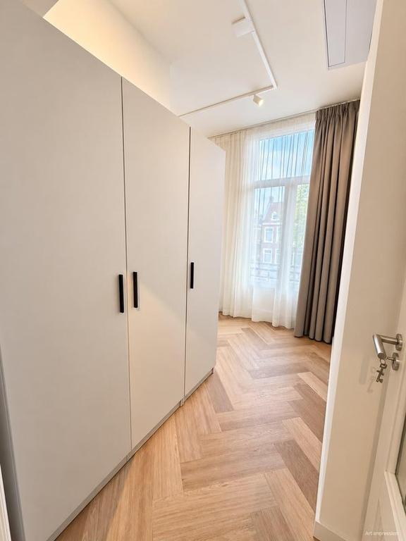 Gemeubileerd appartement met terras aan Overtoom - Afbeelding 12