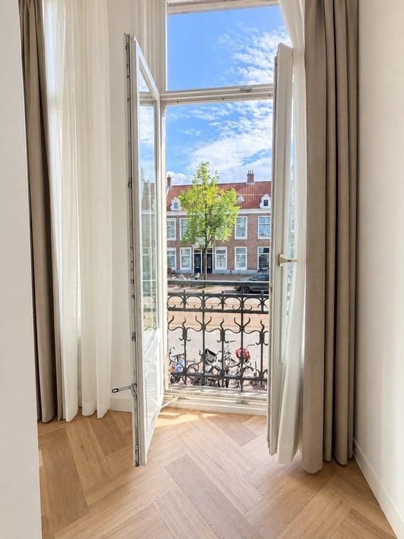 Gemeubileerd appartement met terras aan Overtoom - Afbeelding 14