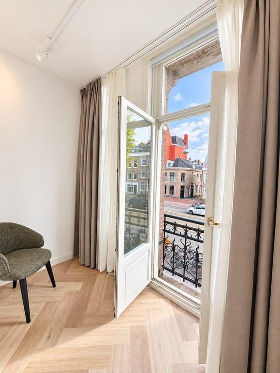 Gemeubileerd appartement met terras aan Overtoom - Afbeelding 15
