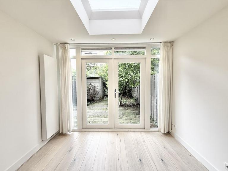 Furnished 1-Bedroom Apartment with Garden - Image 7