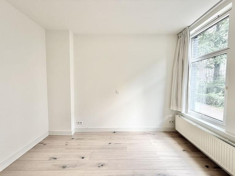 Furnished 1-Bedroom Apartment with Garden - Image 8