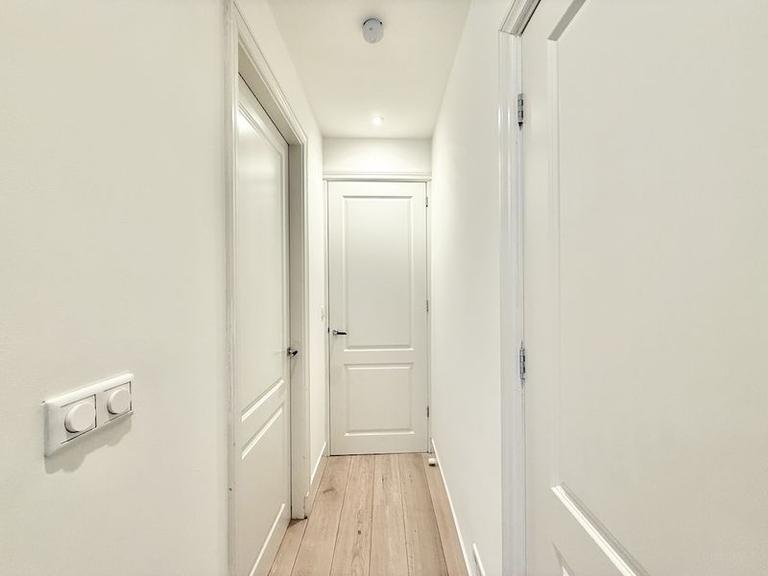 Furnished 1-Bedroom Apartment with Garden - Image 11