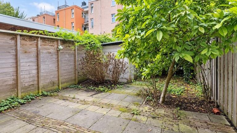Furnished 1-Bedroom Apartment with Garden - Image 12