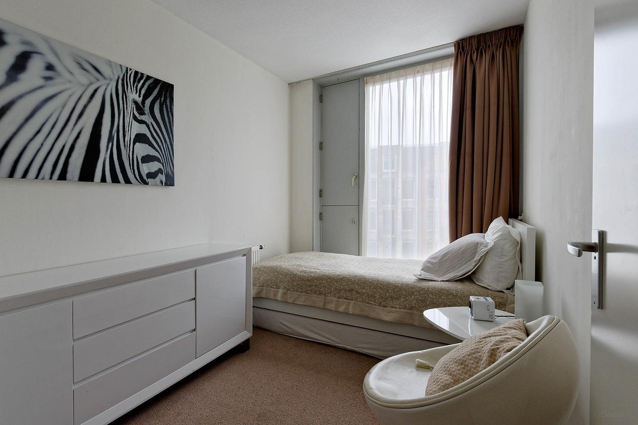 Furnished 2-Bedroom Apartment with Balcony - Image 11