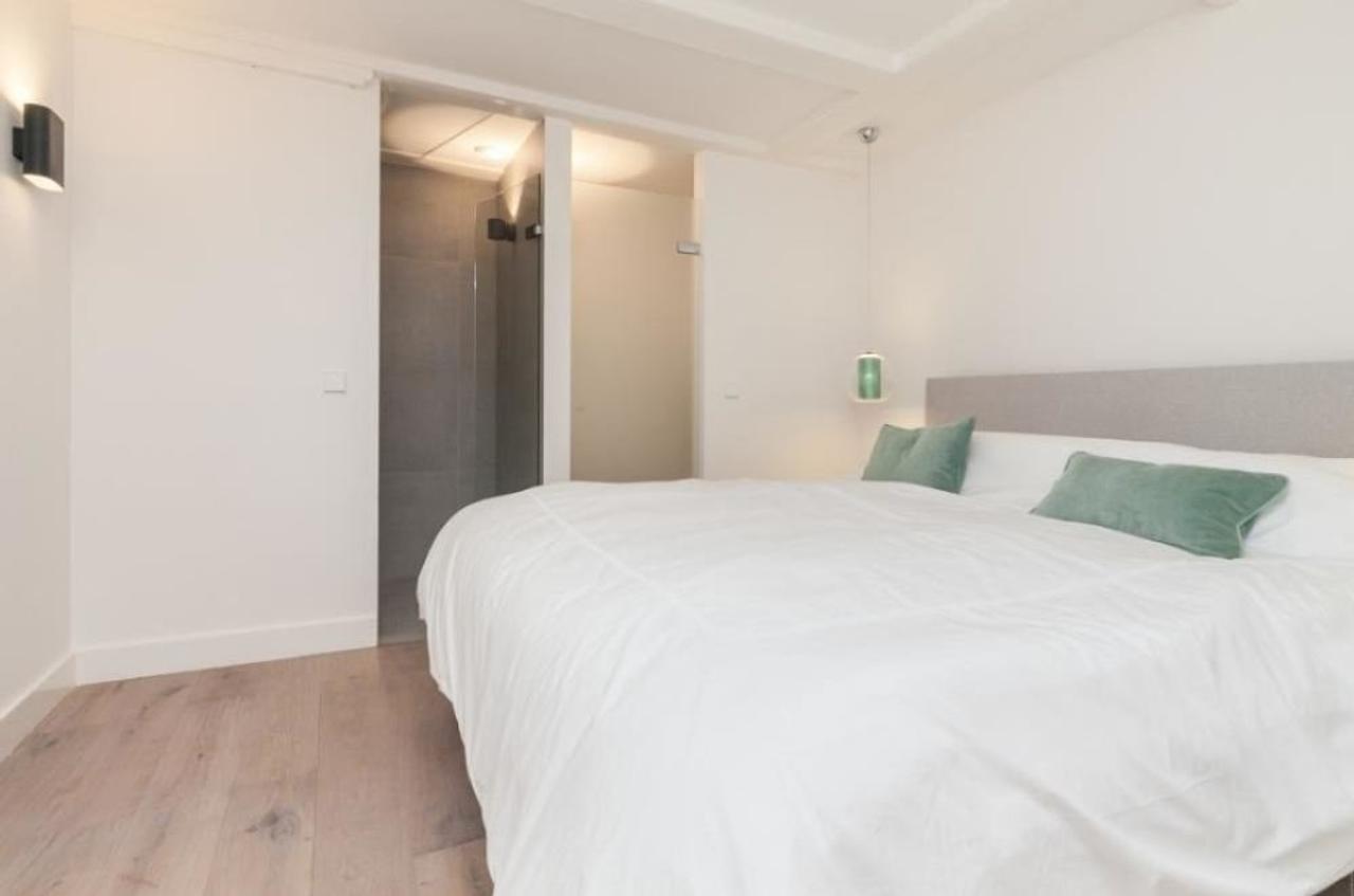 Gemeubileerd 2-slaapkamerappartement met tuin - Afbeelding 9
