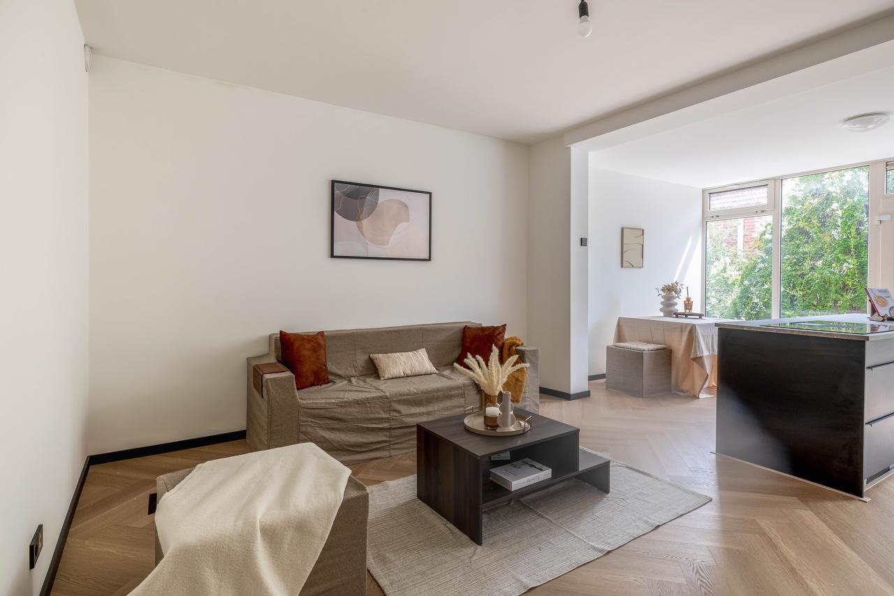 Gemeubileerde benedenwoning met tuin - Afbeelding 6