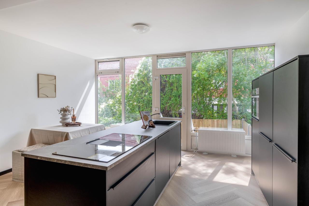 Gemeubileerde benedenwoning met tuin - Afbeelding 10