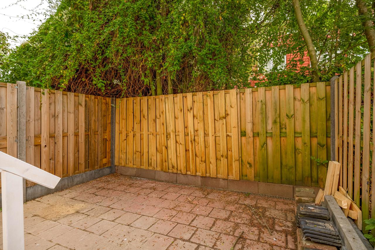 Gemeubileerde benedenwoning met tuin - Afbeelding 14