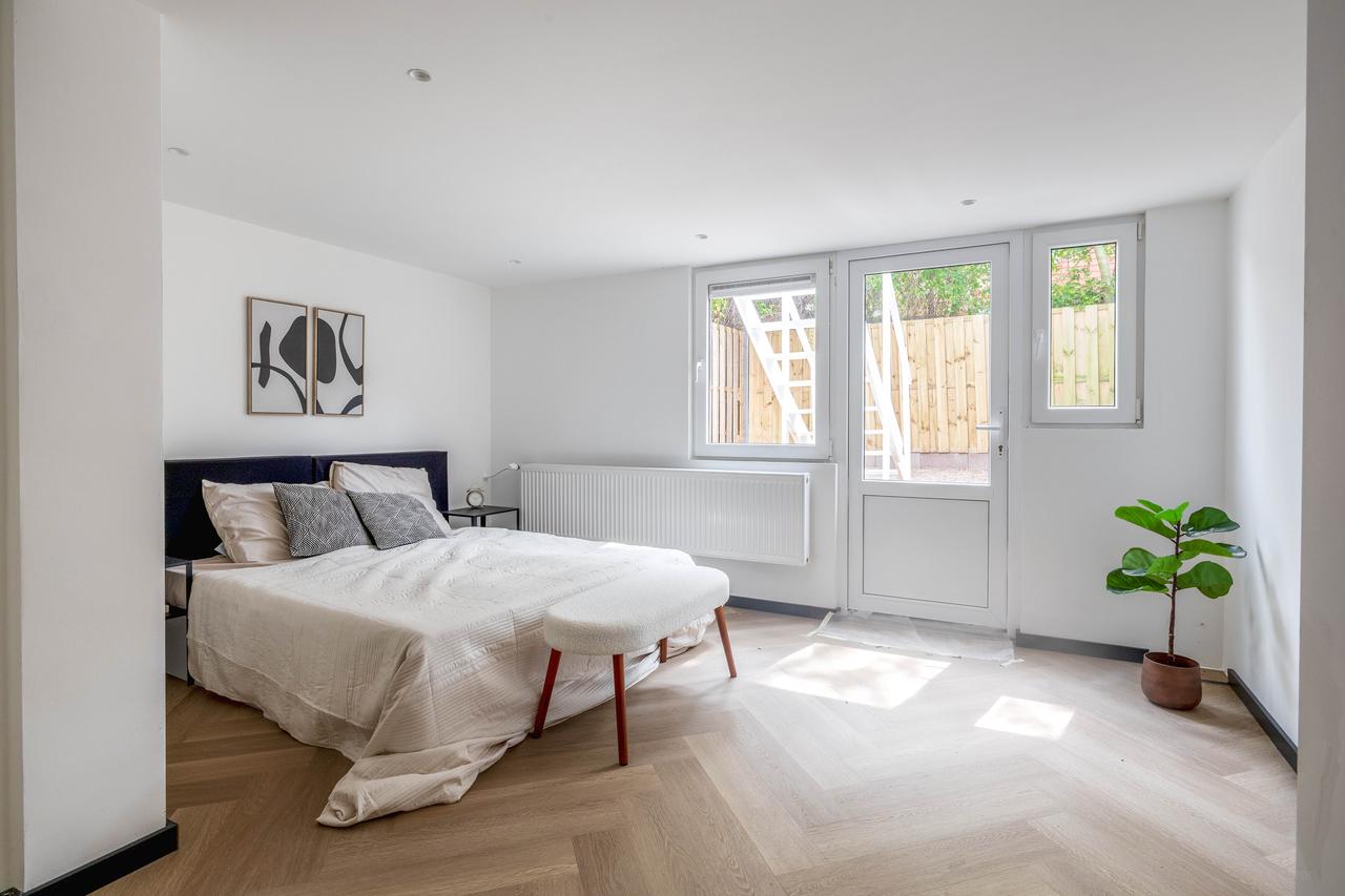 Gemeubileerde benedenwoning met tuin - Afbeelding 21
