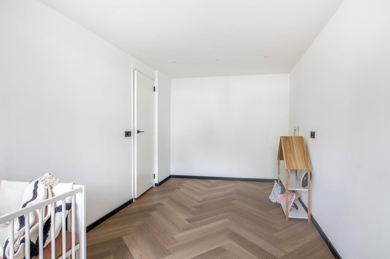 Gemeubileerde benedenwoning met tuin - Afbeelding 23