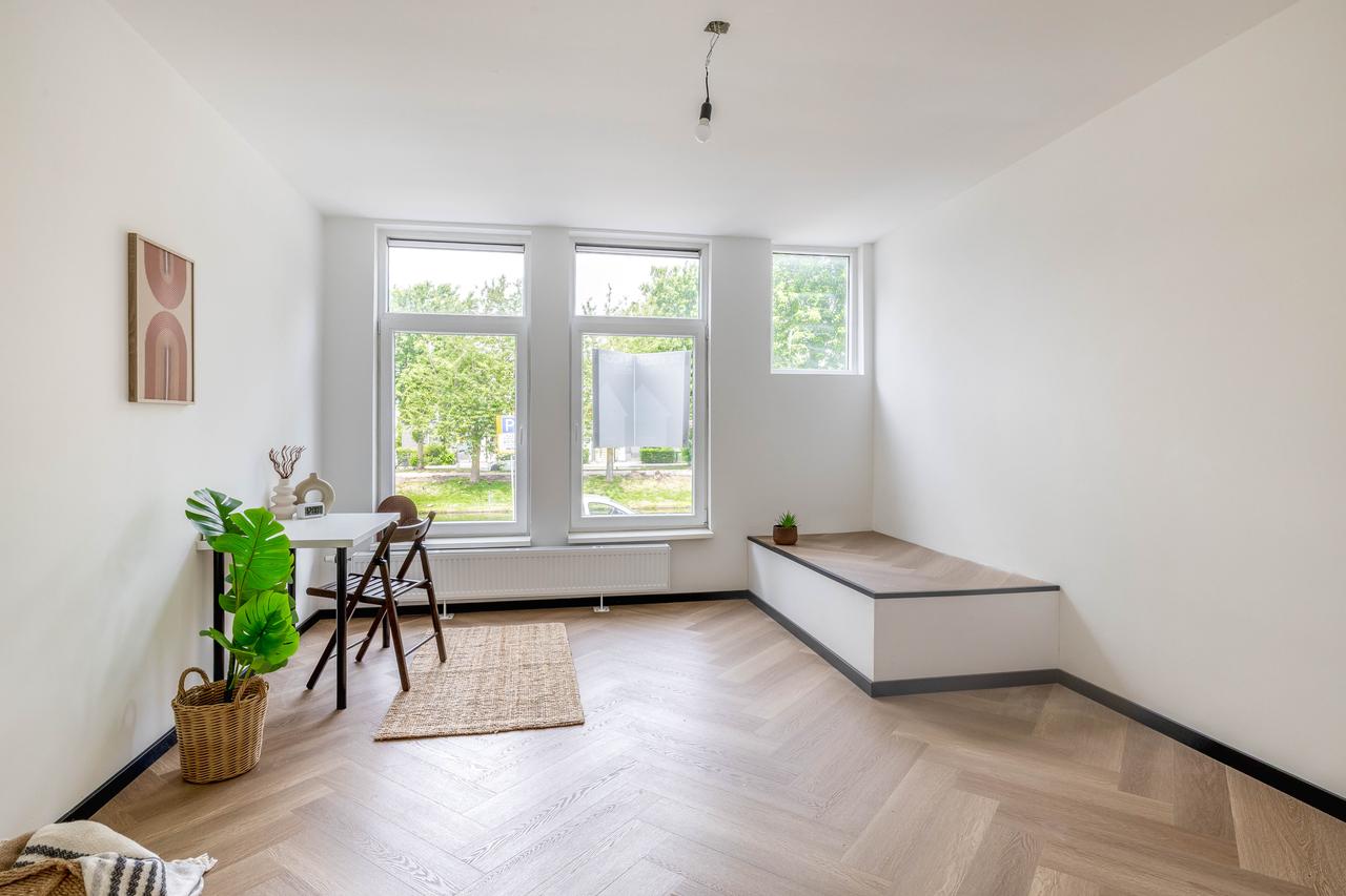 Gemeubileerde benedenwoning met tuin - Afbeelding 24
