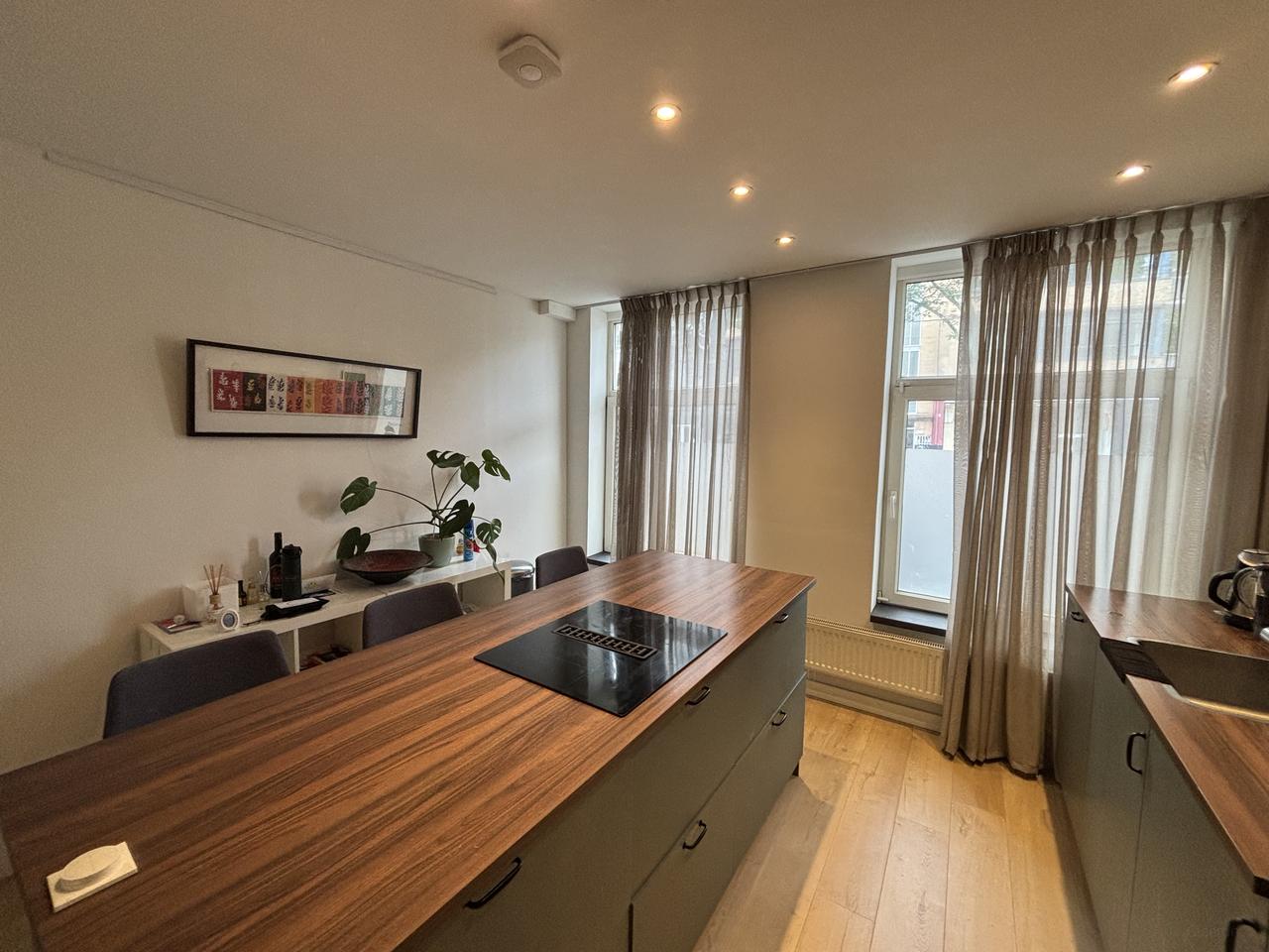 Gemeubileerd appartement met tuin - Afbeelding 9