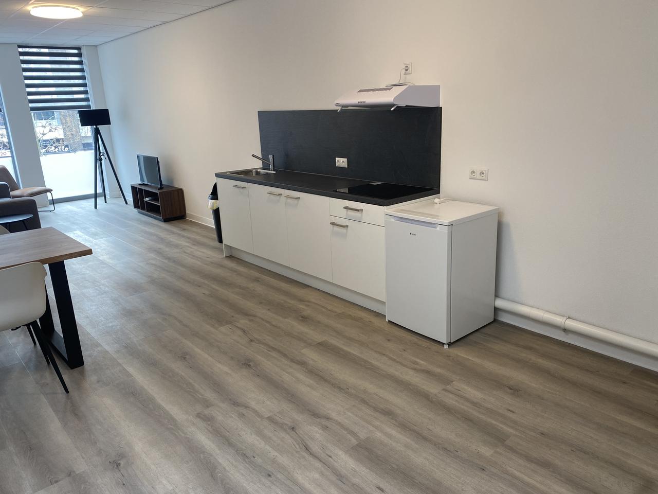 Gemeubileerd appartement met parkeren - Afbeelding 4