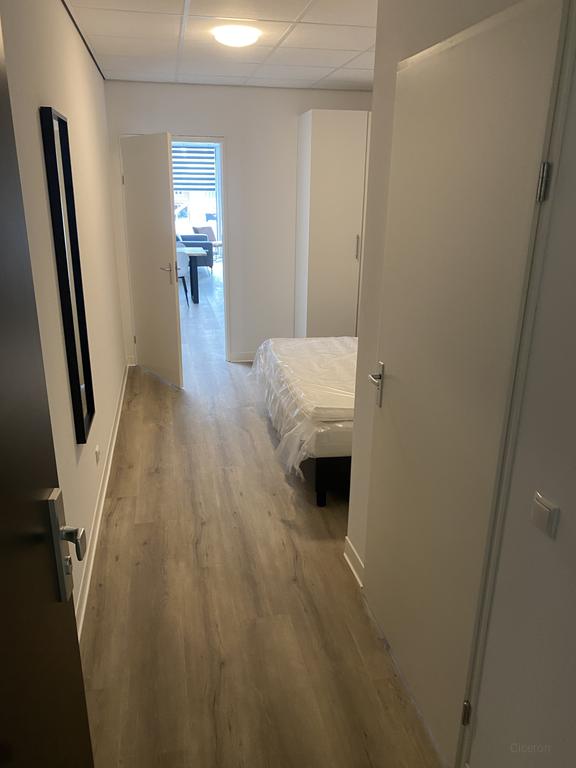 Gemeubileerd appartement met parkeren - Afbeelding 11