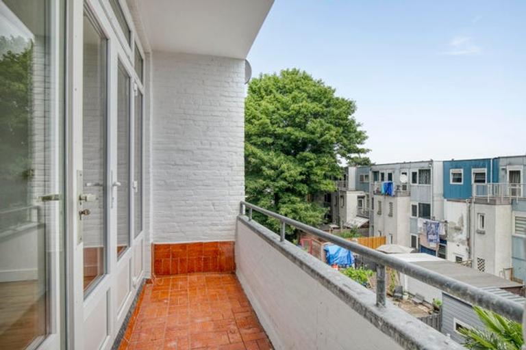 4-Bedroom Apartment with Sunny Balcony - Image 6