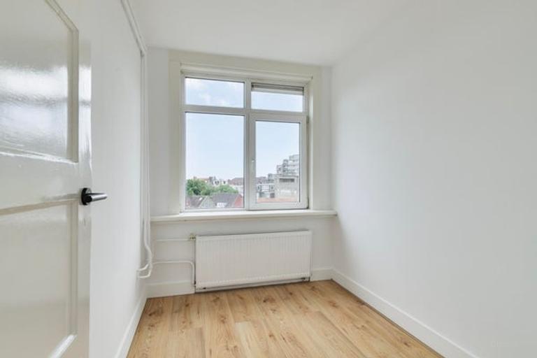 4-Bedroom Apartment with Sunny Balcony - Image 9