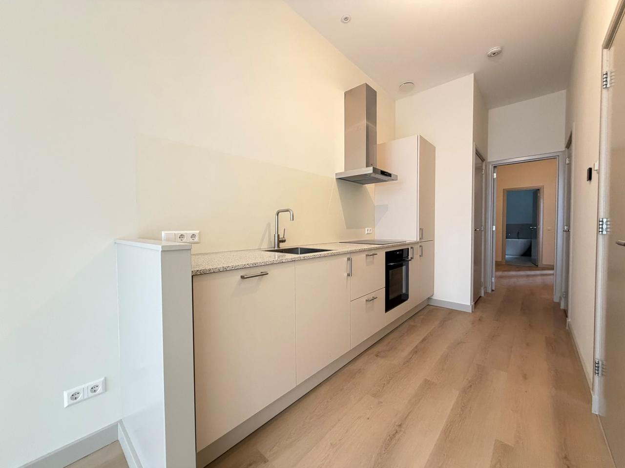 Renovated 1-Bedroom Apartment with Balcony - Image 2