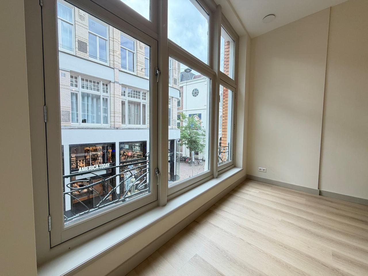 Renovated 1-Bedroom Apartment with Balcony - Image 12