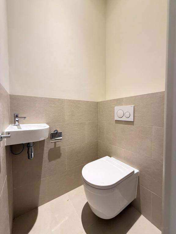 Renovated 1-Bedroom Apartment with Balcony - Image 14