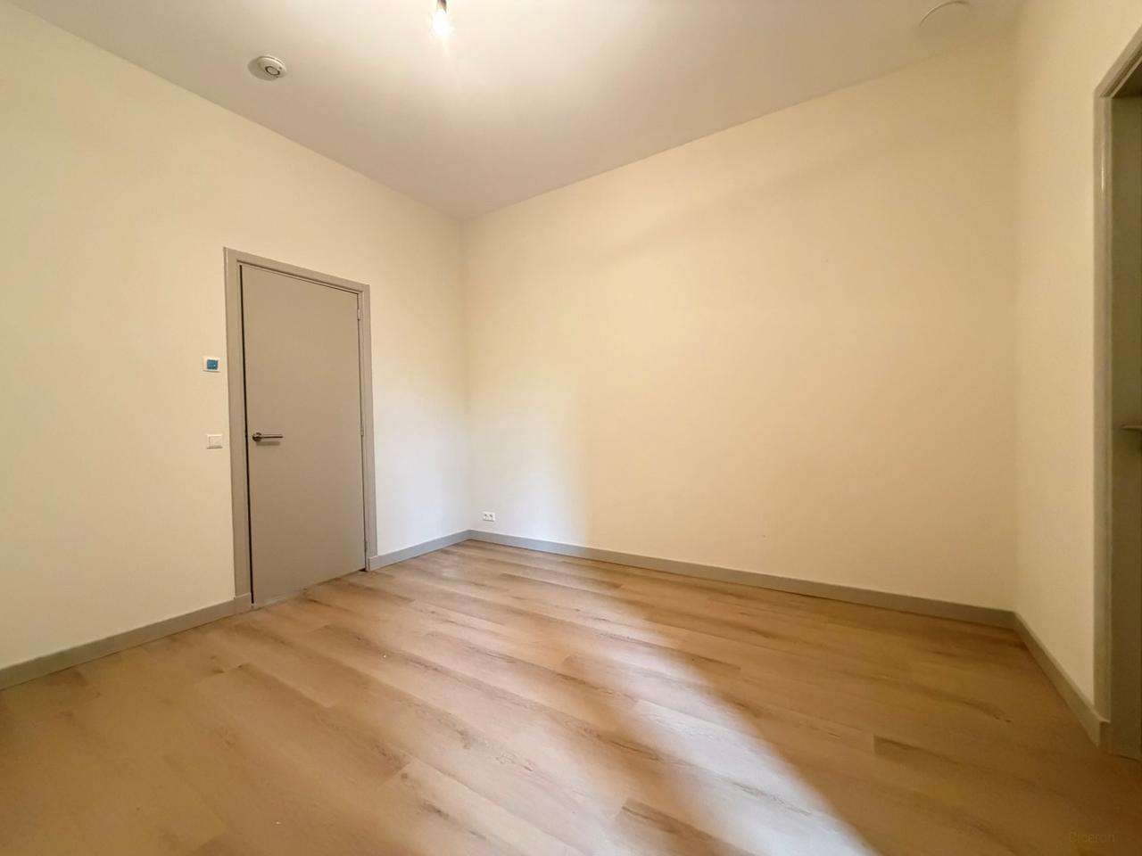 Renovated 1-Bedroom Apartment with Balcony - Image 16