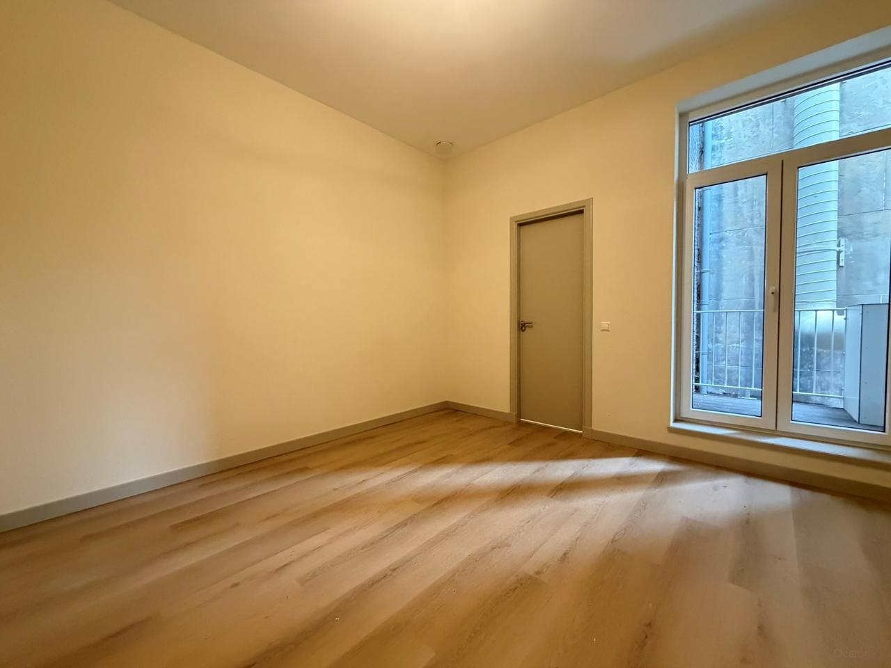 Renovated 1-Bedroom Apartment with Balcony - Image 17