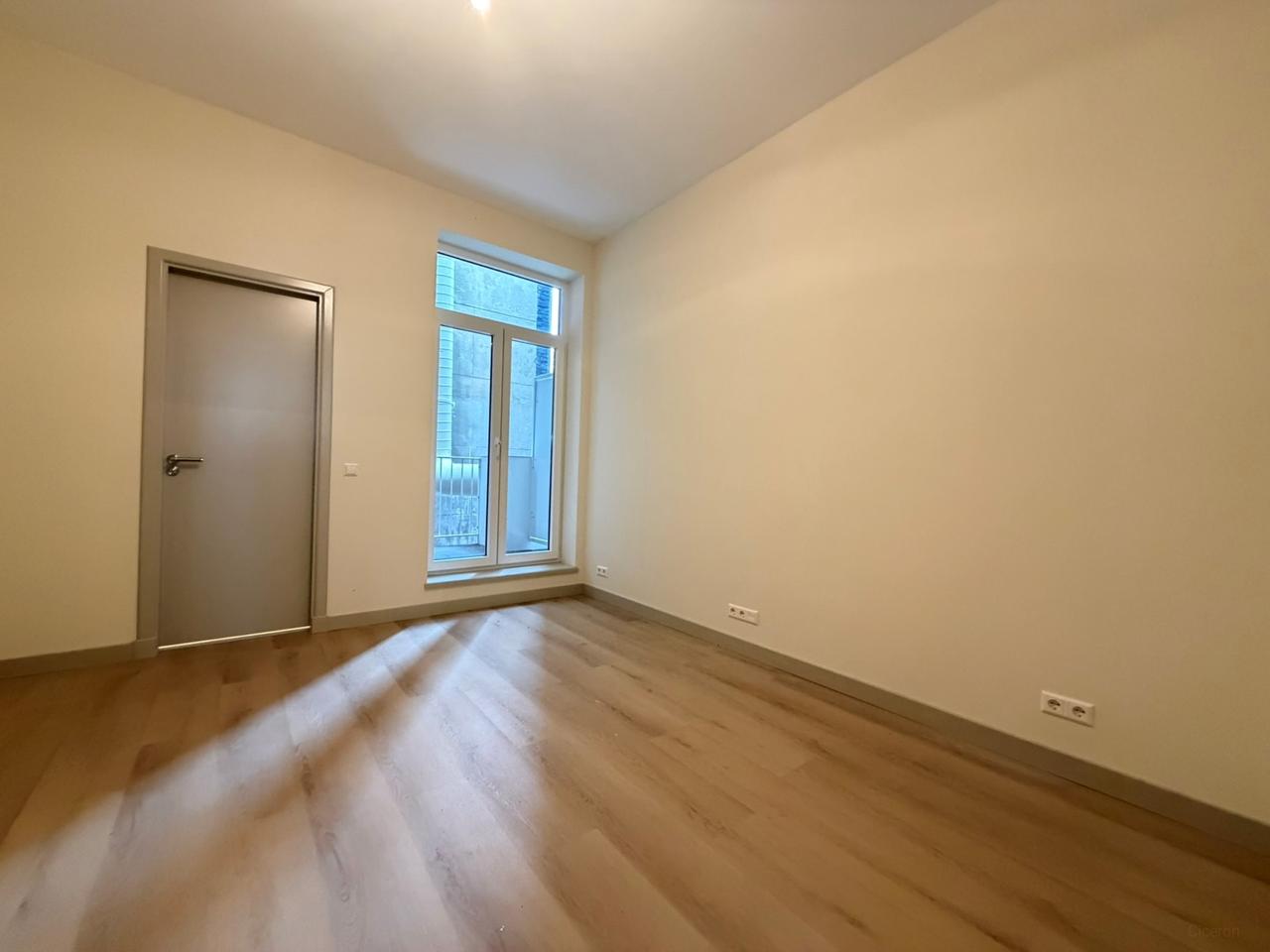 Renovated 1-Bedroom Apartment with Balcony - Image 18