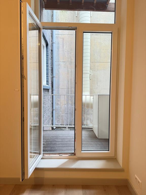 Renovated 1-Bedroom Apartment with Balcony - Image 19