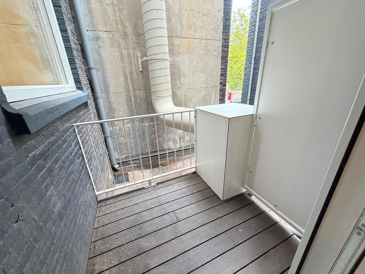 Renovated 1-Bedroom Apartment with Balcony - Image 20