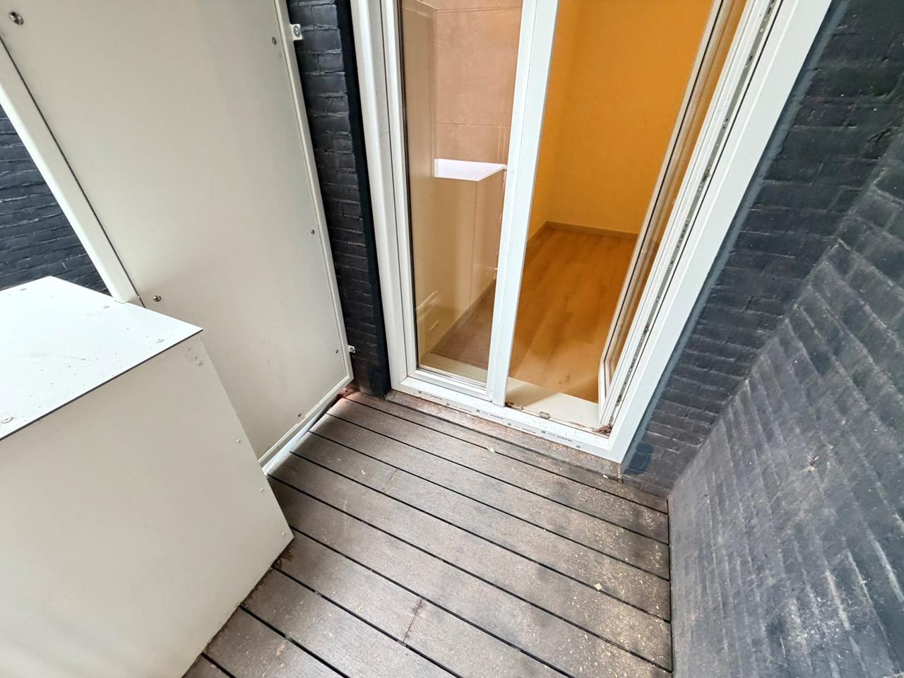 Renovated 1-Bedroom Apartment with Balcony - Image 21
