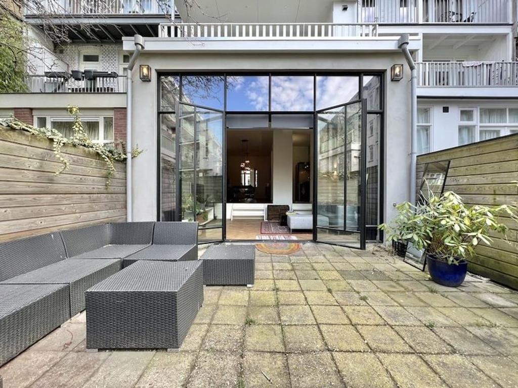 Furnished 1-Bedroom Apartment with Garden - Image 2