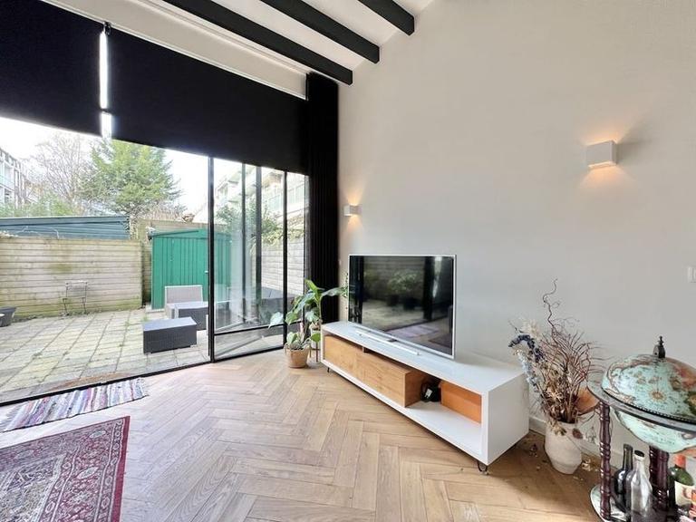 Furnished 1-Bedroom Apartment with Garden - Image 8