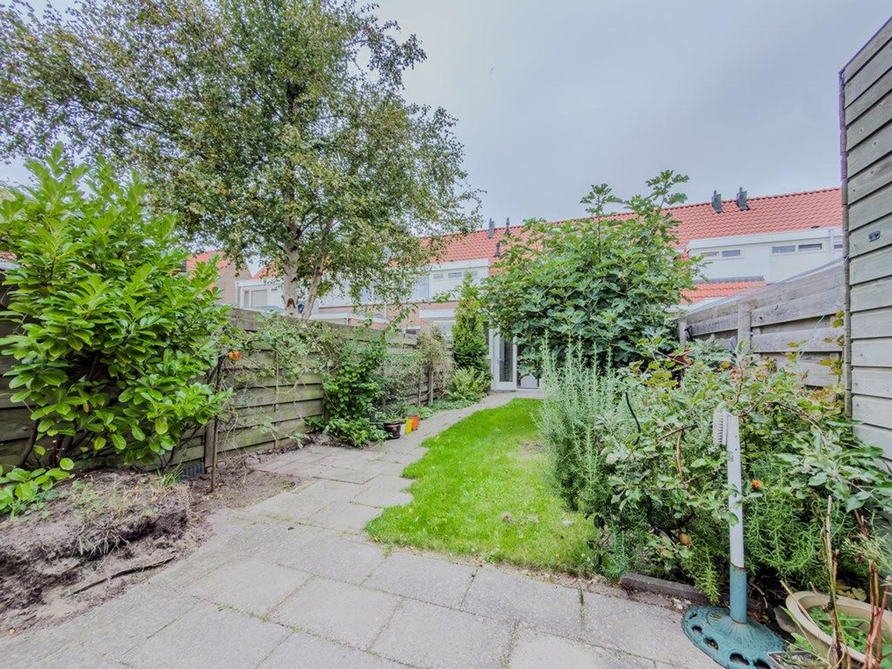 Gemeubileerd huis met groene tuin - Afbeelding 7