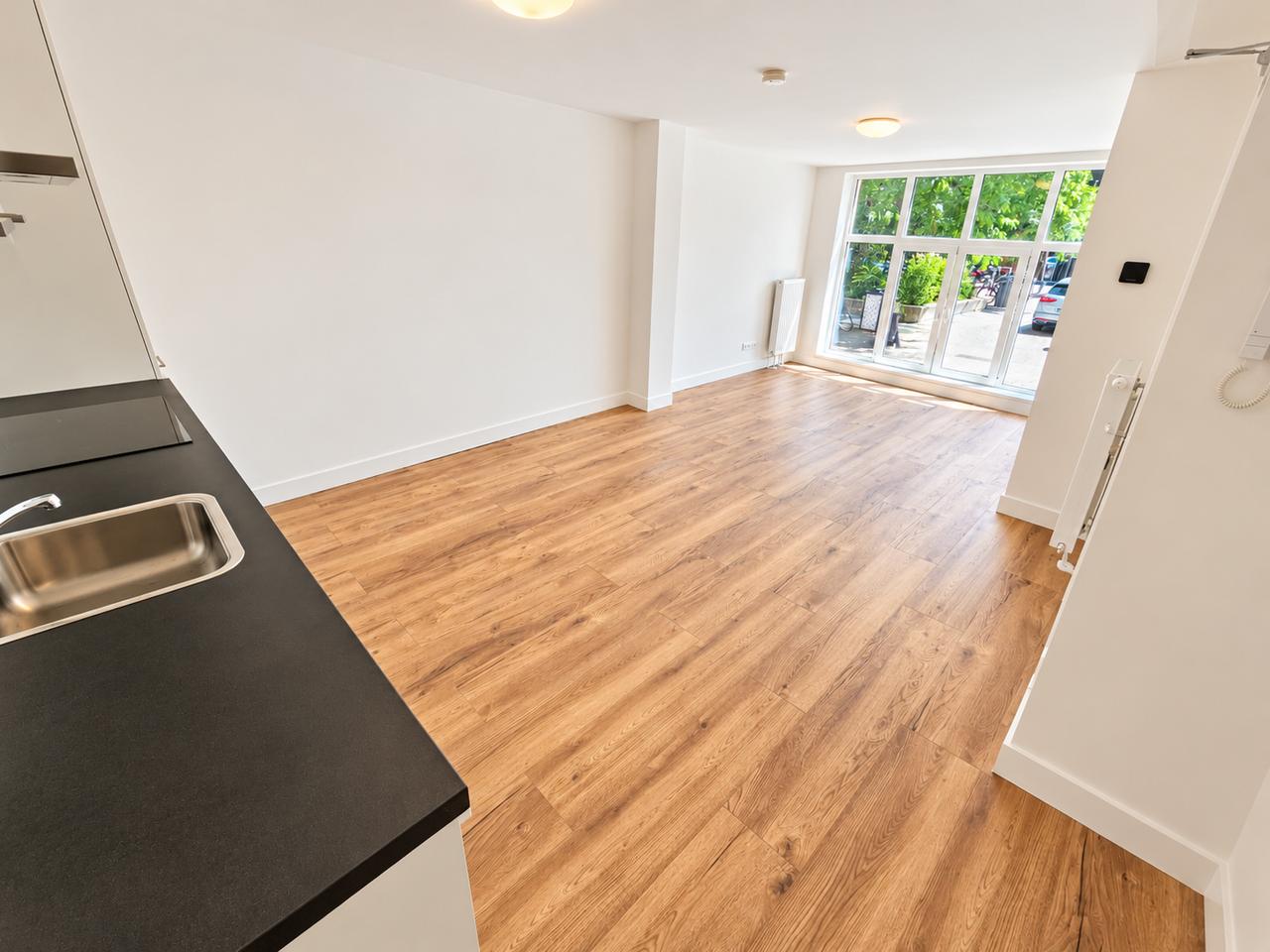 Benedenwoning met 4 slaapkamers en tuin - Afbeelding 2