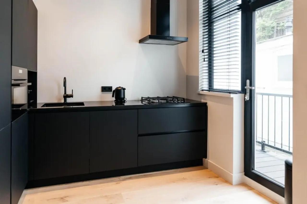 Furnished 1-Bedroom Apartment with Balcony - Image 4