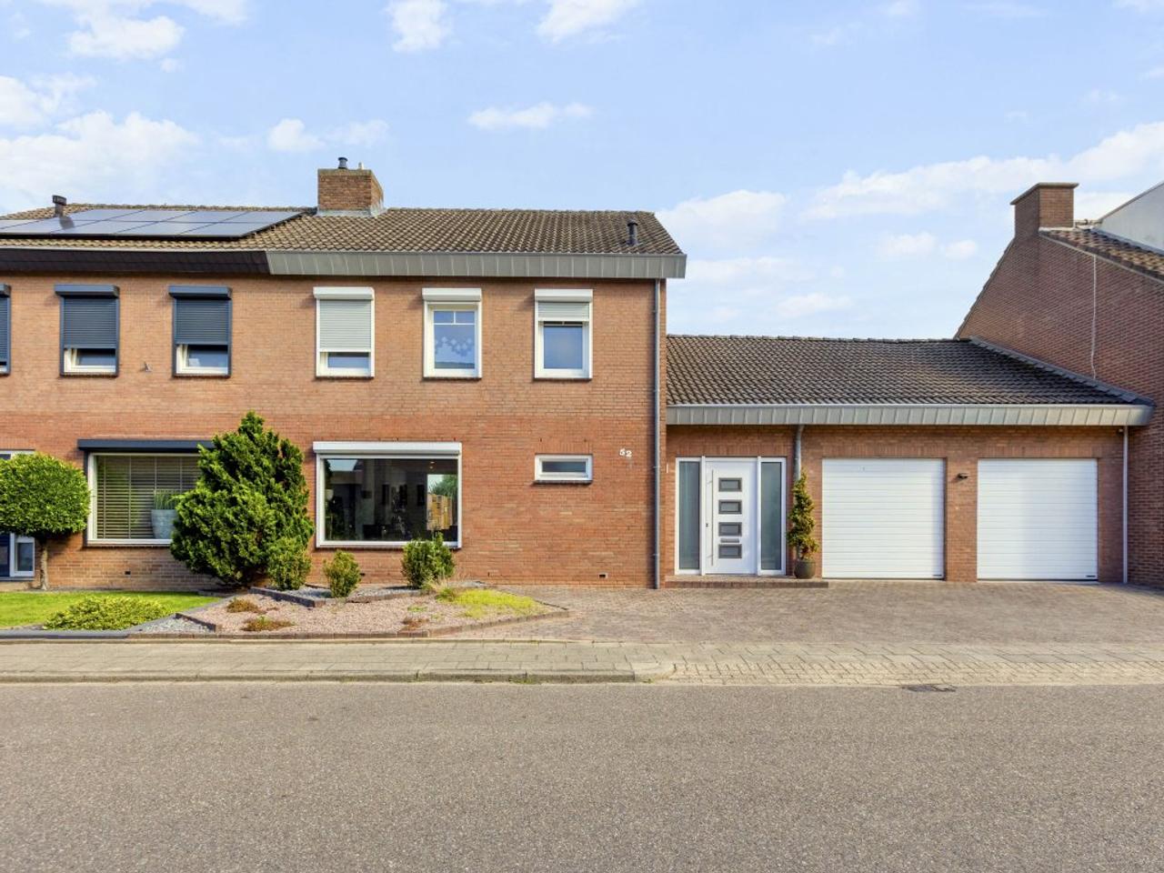 161 m² family home with garden and garage - Image 1